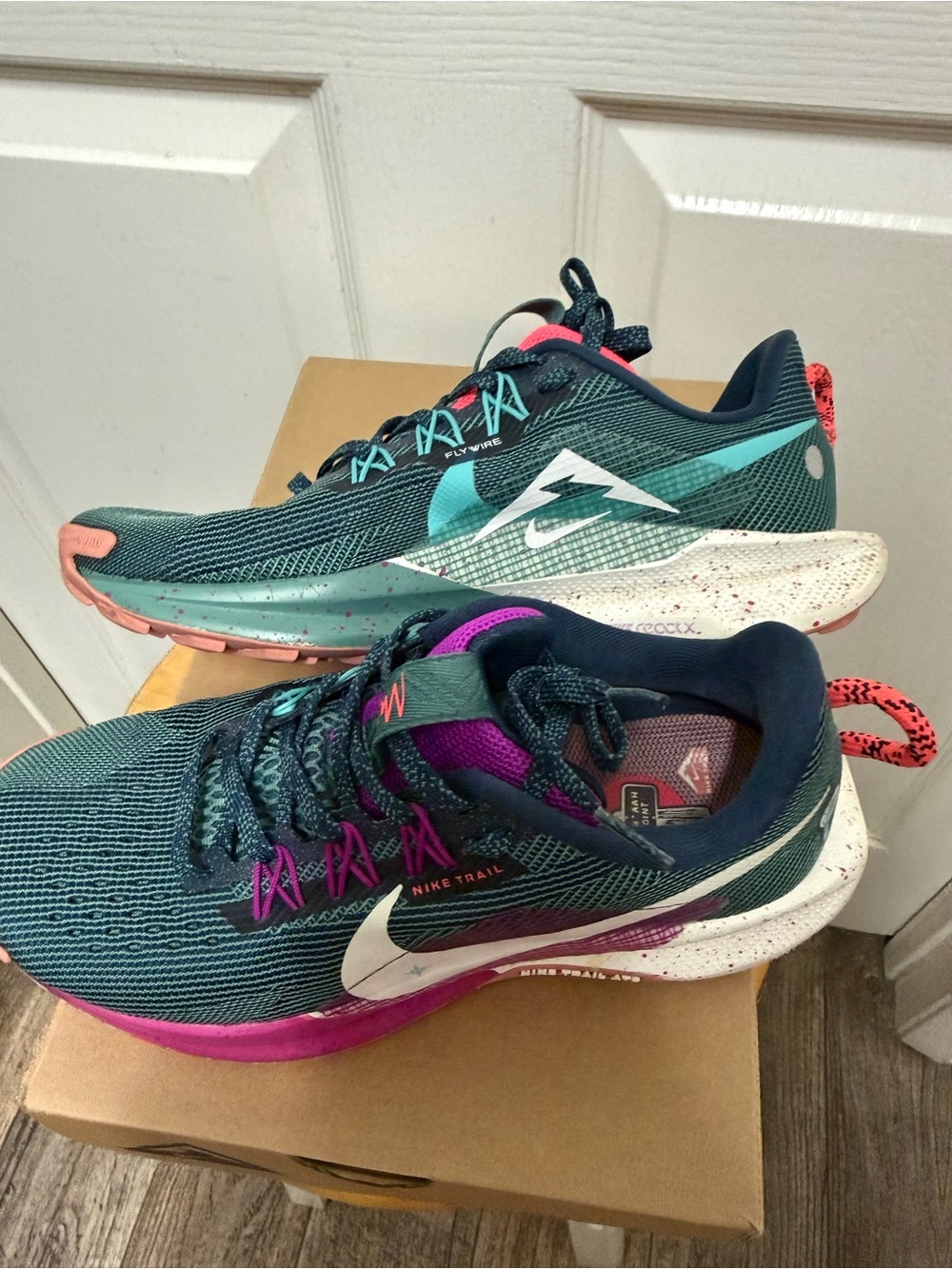 Nike Women's Trail Runners in Teal with Pink and Coral Accents